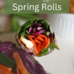 An image looking down on the insides of a spring roll with the text "fresh veggie spring rolls"