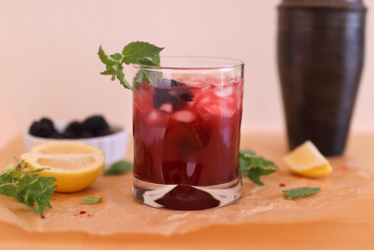 a blackberry bourbon smash with mint and blackberries