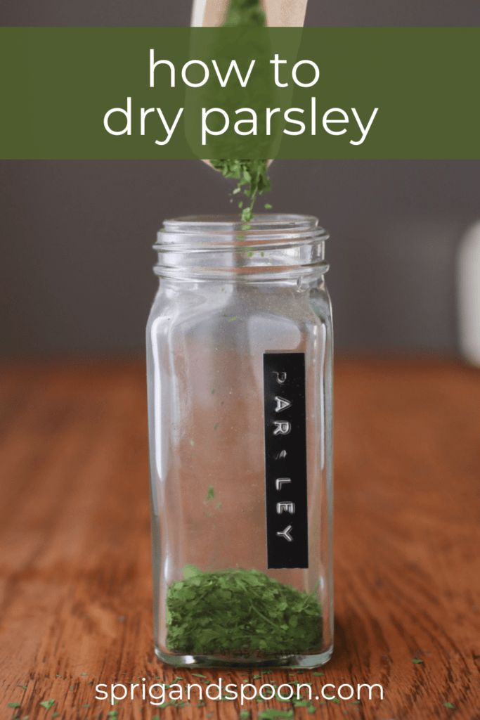 how to dry parsley with dried parsley being poured into a jar