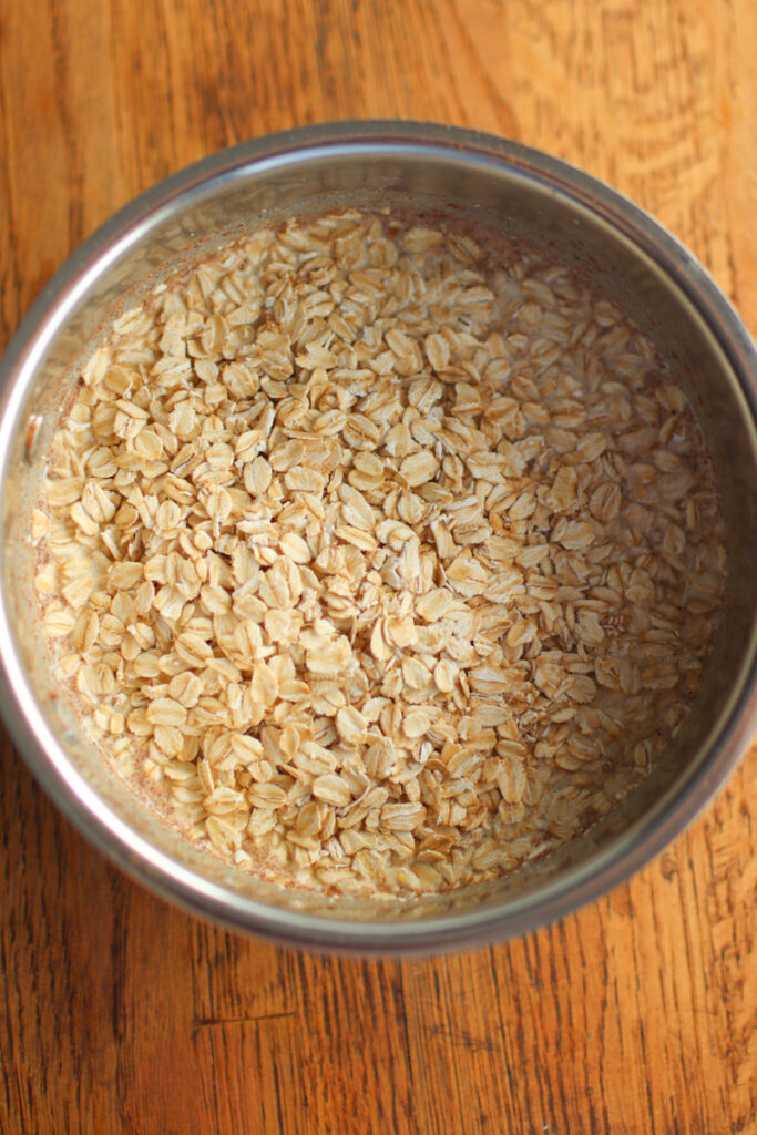 Adding oats to a small saucepan