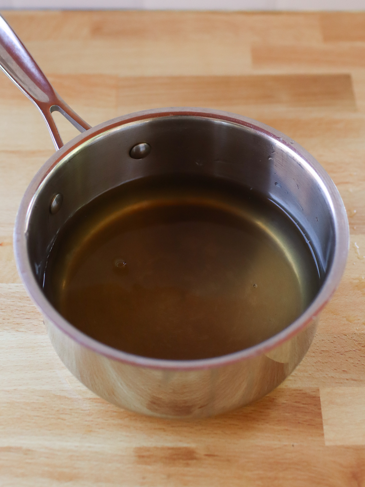Pickle brine in a small saucepan. 